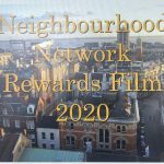 City skyline overlaid with large gold text reading 'Neighbourhood Network Rewards Film' and the year '2020' in the foreground.